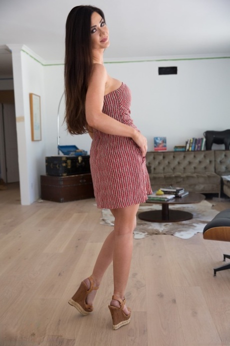 Classy brunette babe Kendall Karson shows her big fake tits and nice ass