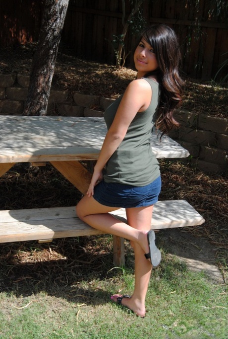Latina amateur Layla Rose exposes her big naturals during a no panty upskirt