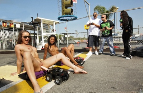 Black and white girls fucked by RC cars with dildos