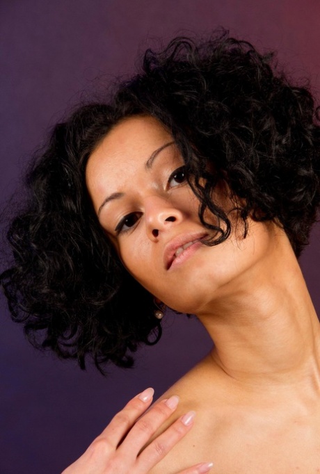 Brunette female Pammie Lee frees her nice tits and perfect ass from swimsuit