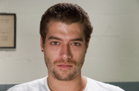 Gorgeous nurse with a nice butt Dani Daniels strips and poses in high heels