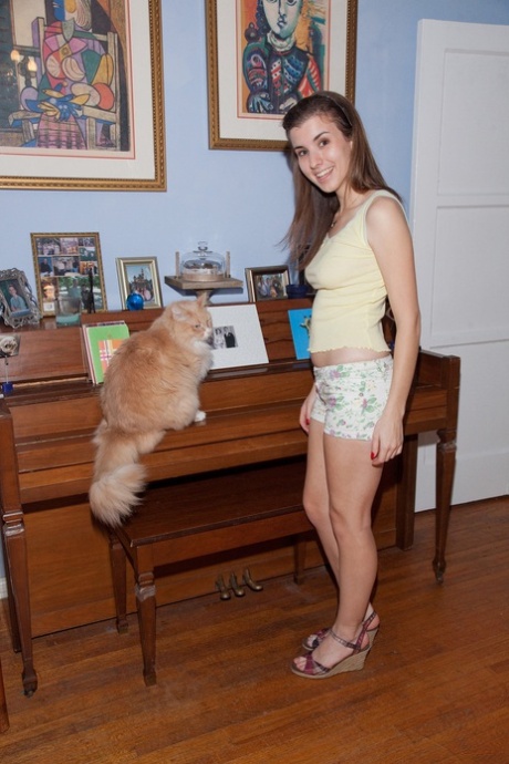 Canadian solo girl Melissa Johnston strips to her panties in the conservatory