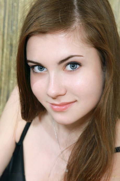 Glamourous Euro teen Marta E revealing full all natural teen breasts