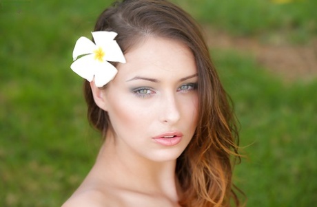 Beautiful babe model Yaryna posing for solo shoot outdoors in the nude