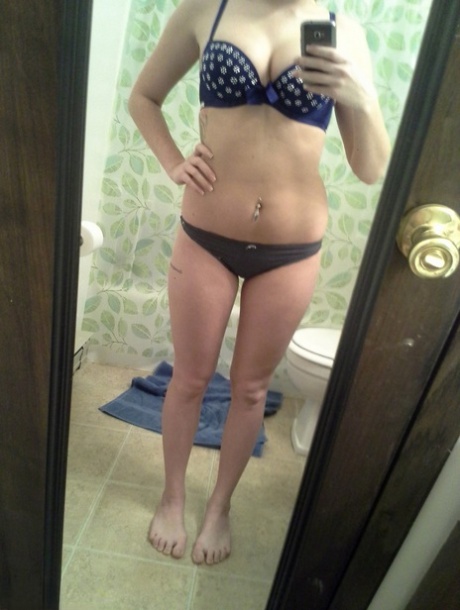 Stacked brunette cutie Freckles 18 takes pictures of her naked body