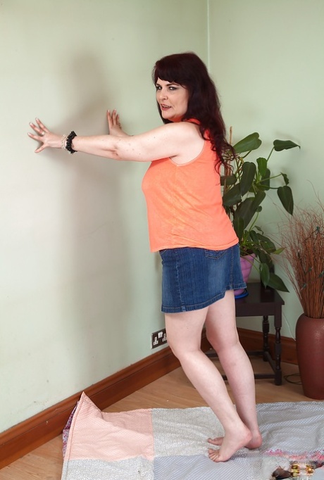 Chubby mature mom Christiana X spreading her wet hairy pussy