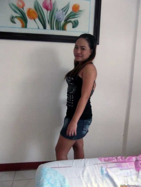 Happy little Asian Anna Marie strips to show off nice firm breasts & spread