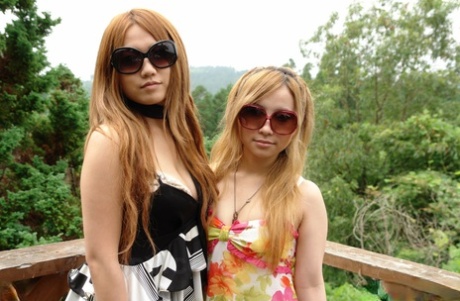 Japanese girls strip naked outdoors exposing hairy pussy for public toying