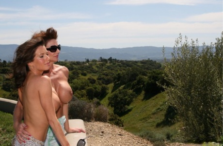 Mature MILFs Deauxma and Veronica Avluv don shades before a first lesbian kiss