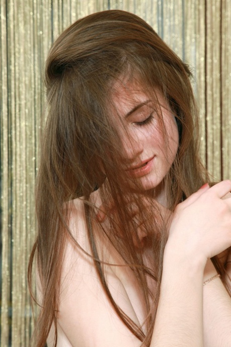 Beautiful babe Marta E poses naked while she waits for her tardy girlfriend