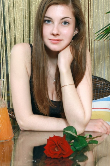 Beautiful babe Marta E poses naked while she waits for her tardy girlfriend