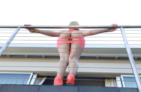 Beautiful European blonde Bibi Noel fondling nice big tits in sexy outfit