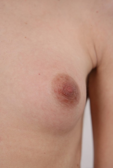 Skinny 18 year old virgin Natalia takes off her clothes to stand in the nude