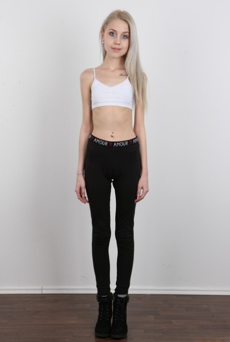 Skinny 18 year old virgin Natalia takes off her clothes to stand in the nude