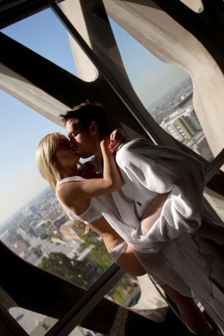 Stocking clad Tasha Reign displaying big tits while receiving oral and anal