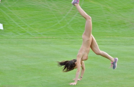 Fit chick strips off sports workout clothes to model naked on golf course