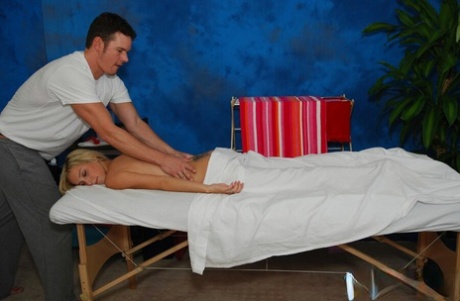 18 year old blonde with big tits gets a surprise fuck by her masseur