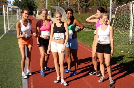 Girls running team show enjoy a hot lesbian pussy licking after game shower