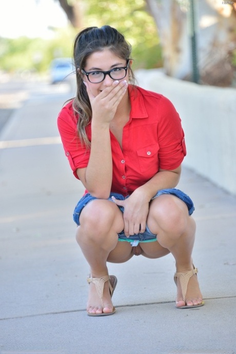 Cute teen in glasses showing small tits on street & fingering shaved pussy