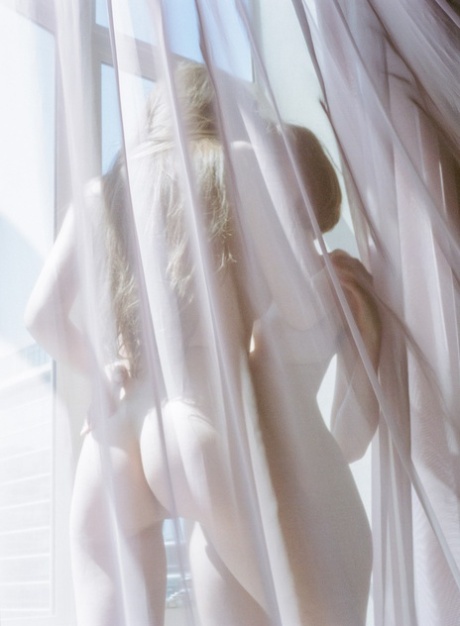 Naked hotties with nice tits Emily Bloom & Liara Roux pet nude in the window