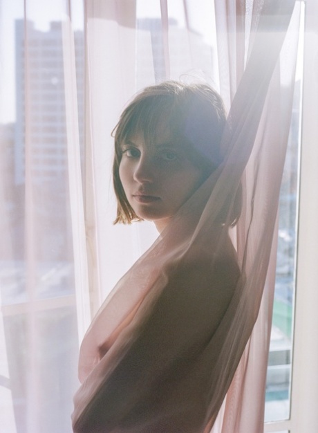 Naked hotties with nice tits Emily Bloom & Liara Roux pet nude in the window