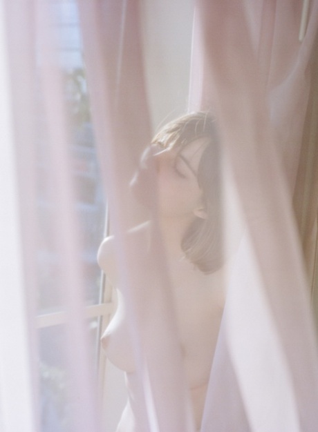 Naked hotties with nice tits Emily Bloom & Liara Roux pet nude in the window