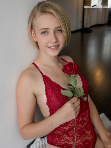 Sweet blonde teen Kamilla takes off red lingerie to go bare naked