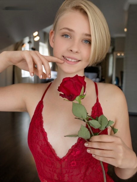 Sweet blonde teen Kamilla takes off red lingerie to go bare naked