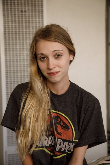 Alluring blonde Riley Anne shows off her beautiful natural tits