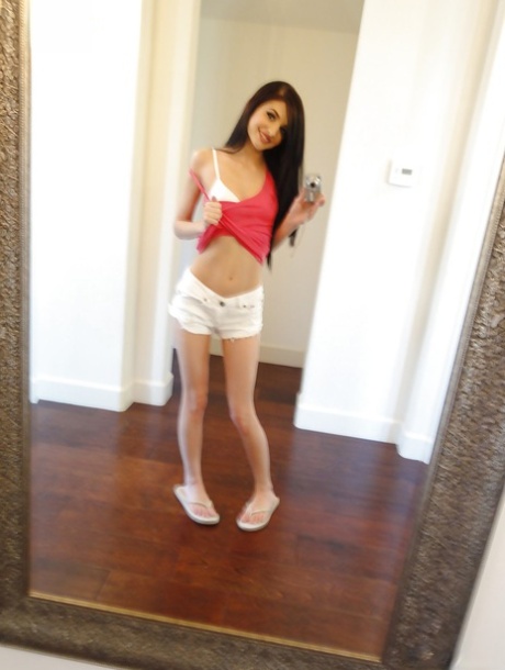 Skinny teen brunette Zoey Kush stripping and picturing herself