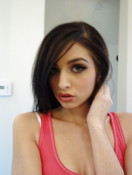 Skinny teen brunette Zoey Kush stripping and picturing herself