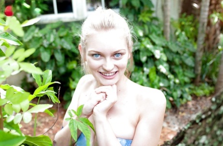 Young blonde girl Alli Rae fingering asshole in the woods in knee socks