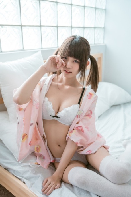 Barely legal Asian teen flaunting her gorgeous body in her cute lingerie