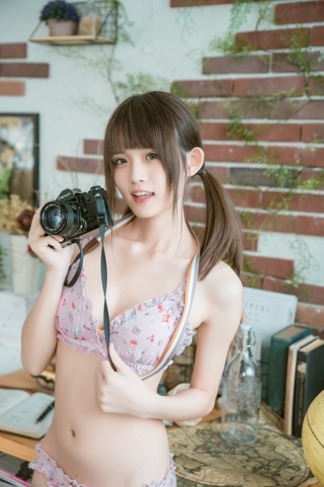 Barely legal Asian teen flaunting her gorgeous body in her cute lingerie