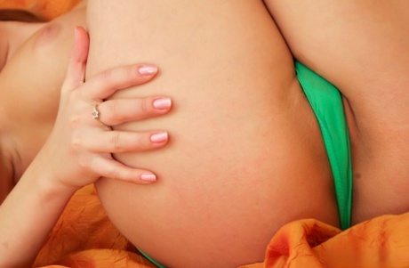 18-year-old hottie Cornelia V gets naked during a solo affair