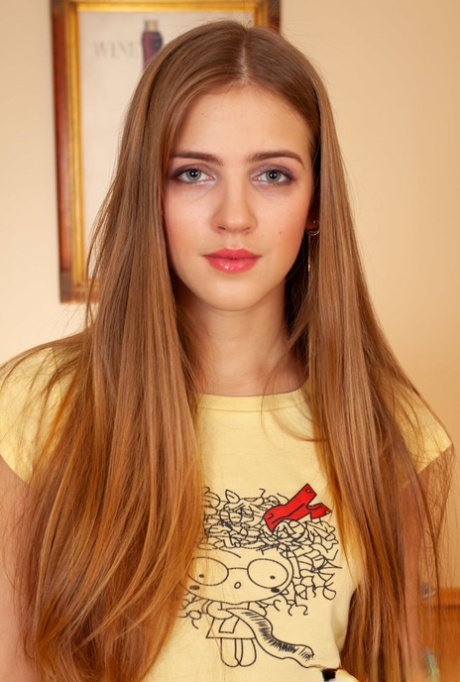 Barely legal teen Hanna A plays with her long hair before showing her ass