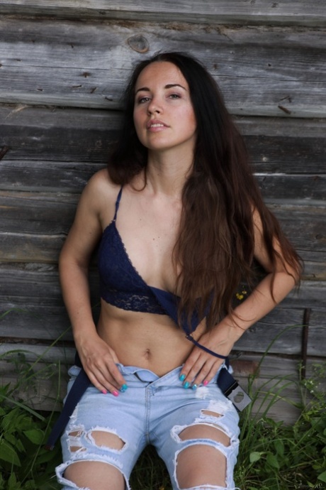 Beautiful babe Nicole V flaunts her big ass in a sexy outdoor striptease