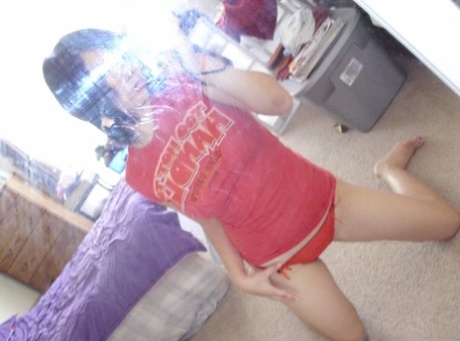 Bootylicious teenage girlfriend takes selfies of her hot body while stripping