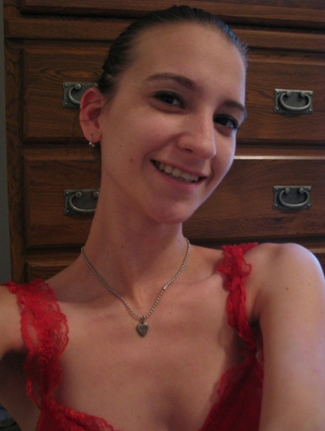 Cute amateur teen Brandi Montes poses in her red lingerie and & strips