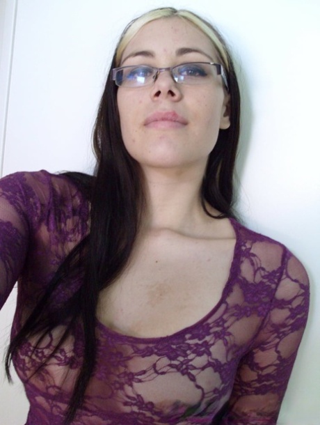 Geeky amateur babe rubs her big boobs and shows her monster ass in a solo