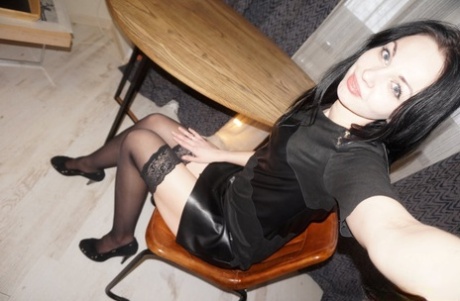 Brunette amateur babe posing naked in her sexy stockings and in tight jeans