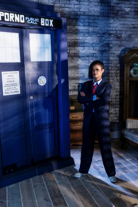 Black dime Skin Diamond strips out of menswear to model in the nude