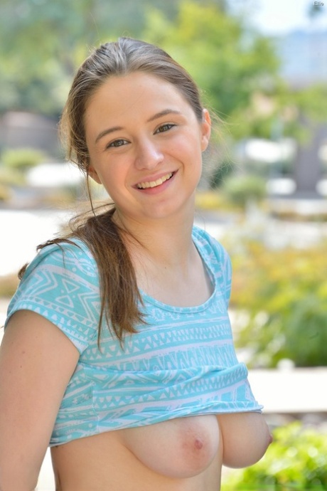 Horny teen flashes her big tits and gives a hot no panty upskirt in public