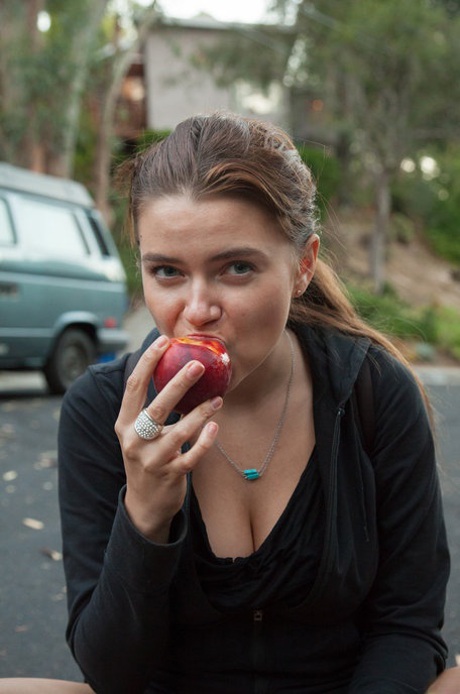 Amateur teen Marina Visconti shows off her big juggs and poses outdoors