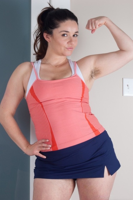 Sports girl Maxine Holloway strips on her mat to reveal her hairy pussy & pits