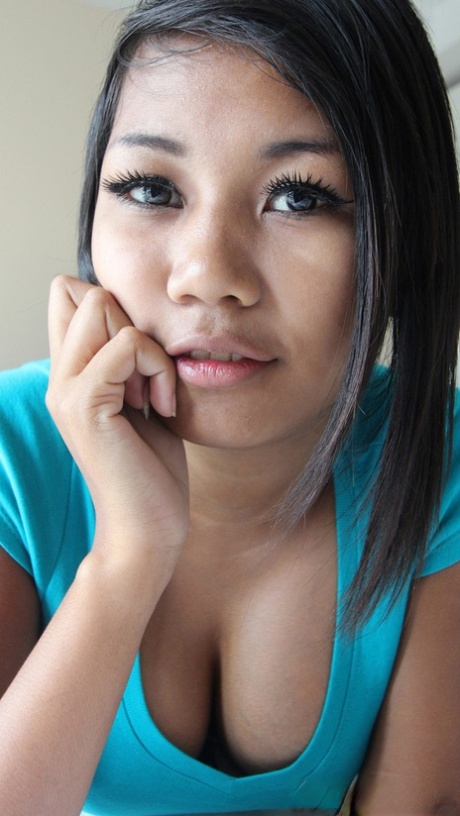 Beautiful Asian with huge dark nipples rubbing her smooth shaved pussy