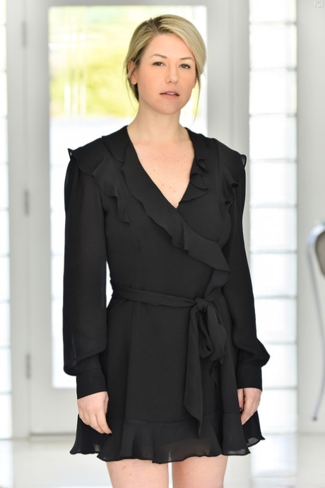 Blonde MILF Kit disrobes & gives herself a hard breast massage in the kitchen