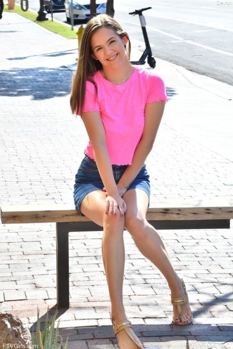 Flexy amateur Devon flashes a no panty upskirt outdoors before modeling naked