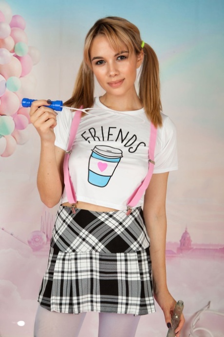 Young looking teen Bianca showcases her tight slit after a striptease