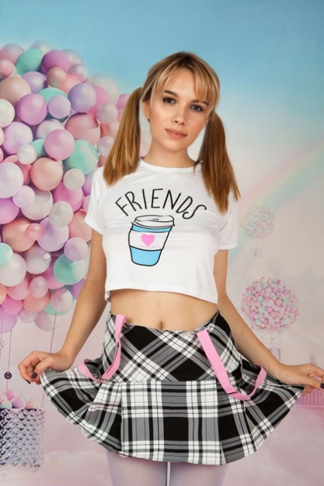 Young looking teen Bianca showcases her tight slit after a striptease